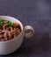 A soup cup with legume stew