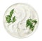 Sour cream in small round plate with dill twig