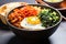 sour kimchi added in korean bibimbap bowl