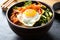 sour kimchi added in korean bibimbap bowl