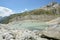 Source of Rhone river, small lake created from melting Rhone Glacier close to Furkapass in Switzerland