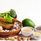 Sources of vegetable protein. Bowls with beans and nuts on a white background