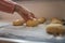 Sourdough balls rising on floured surface