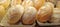 Sourdough bread close-up. Freshly baked round bread with a golden crust on bakery shelves. German baker shop context with rustic