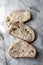 Sourdough bread slices, homemade healthy bread, top view.