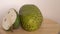 Soursop, Annona muricata L with slice rotate on wooden cutting board