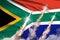 South Africa ballistic missile launch - modern strategic nuclear rocket weapons concept on flag fabric background, military