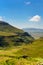 South Africa Drakensberge scenic landscape view -  green Giants Castle wide panorama with blue sky and some clouds