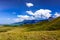 South Africa Drakensberge scenic panoramic landscape view - green giants castle wide panorama with blue sky and some clouds,