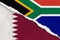 South Africa and Qatar flag ripped paper grunge background. Abstract South Africa and Qatar economics, politics conflicts