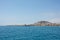 South coast of Tenerife from the sea, with a ship and blue sky