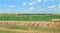 South Dakota rugged terrain with hay bales