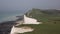 South Downs National Park coast path between Beachy Head and Seven Sisters East Sussex with people walking