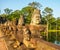 South gate bridge of Angkor Thom with statues of gods and demons