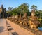 South gate bridge of Angkor Thom with statues of gods and demons