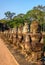 South gate bridge of Angkor Thom with statues of gods and demons