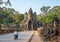 South gate bridge of Angkor Thom with statues of gods and demons