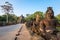 South gate bridge of Angkor Thom with statues of gods and demons