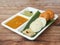 South indian breakfast combination of Medu vada and Idli or idly is a traditional and popular Food served with bowls of chutney
