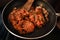 South Indian dish spicy beef fry Kerala, India. side dish ghee rice, appam, parotta, puttu, bread and chappathi, Kerala cuisine ,B