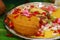 South Indian prayer items on a wedding day, flowers coconut with banana and betel leaf,