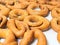 South indian traditional snack item, Kodubale or Chegodilu or Ring murukku isolated on white background in white plate