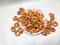 South indian traditional snack item, Kodubale or Chegodilu or Ring murukku isolated on white background in white plate