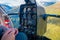 SOUTH ISLAND, NEW ZEALAND - MAY 21, 2017: Pilot using command cabin of the helicopter, in South Westland`s Southern Alps