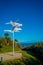 SOUTH ISLAND, NEW ZEALAND- MAY 23, 2017: Unidentified people looking at signpost at Cape Foulwind on the west coast of