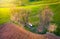 South Moravia landscape with chapel of Saint Barbara from above during spring evening sun light, Moravian Tuscany region