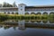 South Pavlovskaya Tower and wall of the Tikhvin Assumption Bogorodichny Uspensky   Monastery with a reflection in the pond.