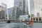 South quay footbridge above water with modern buildings in Canary Wharf