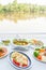 Southeast Asian cuisine set, Japanese shrimps with salad, Fish organs sour soup Thai style, Fish sauce Southern style, fried