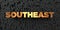 Southeast - Gold text on black background - 3D rendered royalty free stock picture
