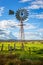 Southern Cross windmill in a rural field with crops