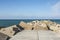 Southern long concrete pier with breakwaters on the Baltic Sea on the Vistula Spit. Baltiysk. Russia