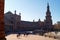 Southern tower, colonnade and the Building of the Old Captaincy General, Spain Square, Seville, Spain