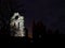 The southern Transept tower of Arbroath Abbey with its distinctive Round Window lit up by Floodlights