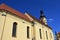 Southern wall and tower of early baroque Saint Jacob`s church in Trnava, western Slovakia, also known as Franciscan church