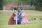 Southern women placing battlefield grave markers