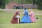 Southern women placing battlefield grave markers