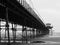 southport pier showing beach and structure in the evening monochrome