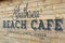 Southsea Beach cafe sign on wood