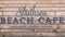 Southsea beach cafe sign on a wooden background