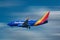 Southwest Airlines aircraft preparing to land in airport area 4