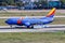 Southwest Boeing 737-700 airplane at Dallas Love Field airport in the United States Triple Crown One Sonderbemalung