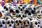 Souvenir ceramic skulls at a sidewalk gift shop.