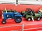 Souvenir Old Retro Vintage blue and green tractors Sold In a Market