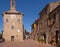 SOVANA, TUSCANY, ITALY JUNE 16, 2019: Ancient square in the old town founded in Etruscan times. Here is the Palazzetto