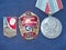 Soviet awards for the valiant work `Drummer of Communist Labor`, `Drummer of the Five-Year Plan` and the medal `Veteran of Labor`